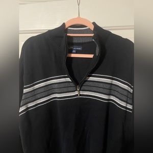 Black sweater with distinct blue and gray stripes